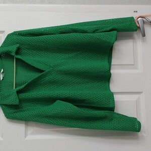 A H & M green sweater, size L